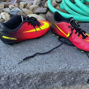 Nike Mercurial Soccer Cleats - Black, Red, and Yellow